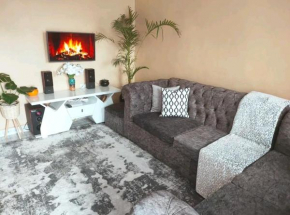 Cozy 1-bedroom with wifi, security & parking.